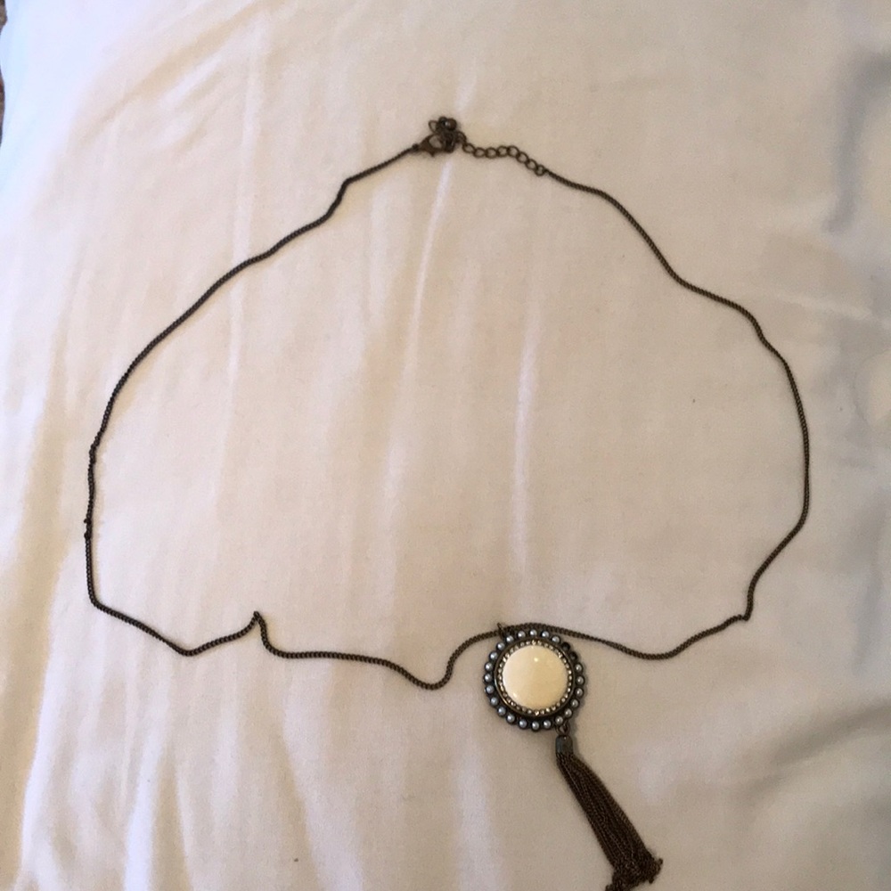 Long gold chain necklace with cream accent